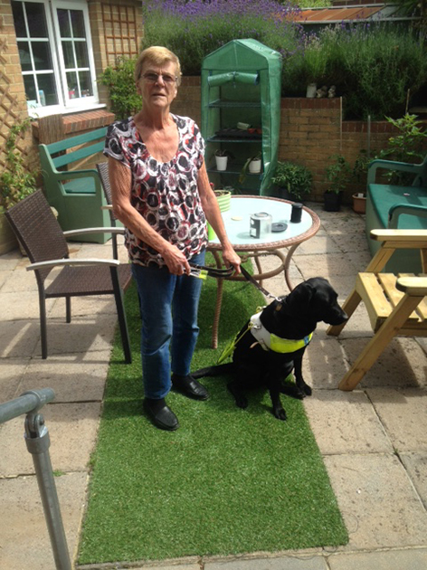 Sue Harold with guide dog Ula